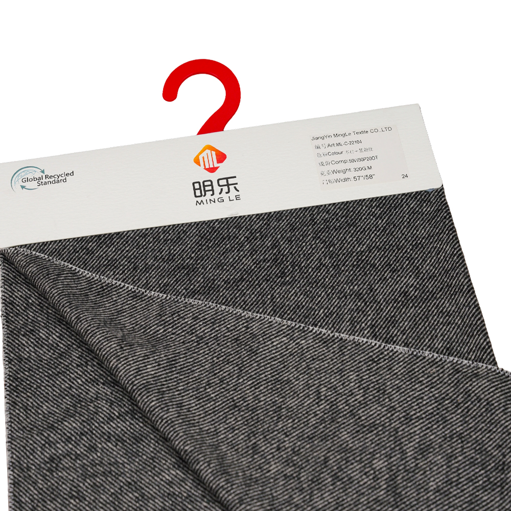 50 % vlna, 30 % polyester, 20 % ostatní vlákno, 320 G/M, špinavě bílá + černá, keprová flanelová tkanina, ML-C-22104